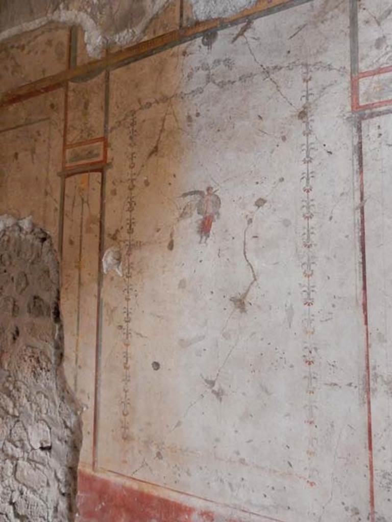 VI.15.1 Pompeii. May 2017. Painted decoration from south end of west wall.
Photo courtesy of Buzz Ferebee.

