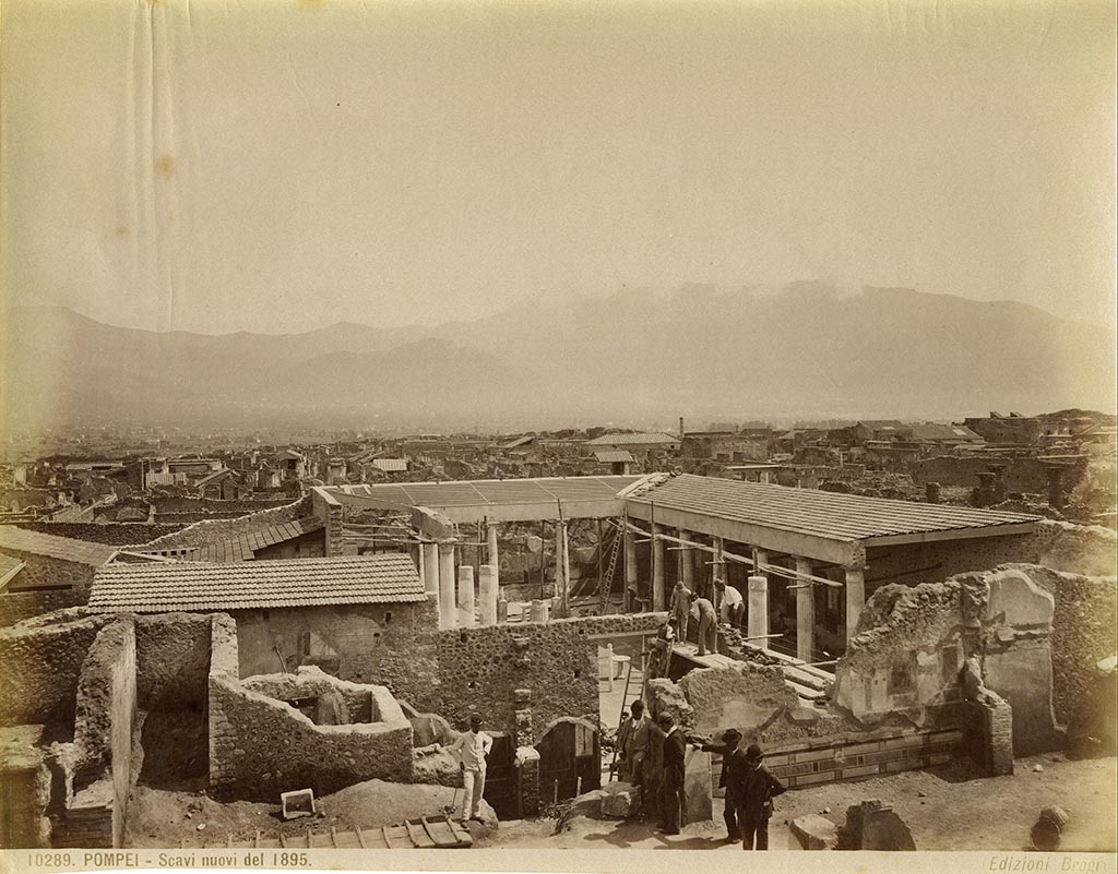 VI.15.1 and 2 Pompeii. 1895 photograph by Brogi, no.10289 Pompei - Scavi nuovi del 1895.
Looking south towards the north wall of VI.15.1 being excavated, taken from the area of VI.15.2.
In the front centre of the photo is the doorway and south wall of the small peristyle “s” with its decoration, now lost, and to its left is the south wall of triclinium “t”. 
Photo courtesy of Rick Bauer.

