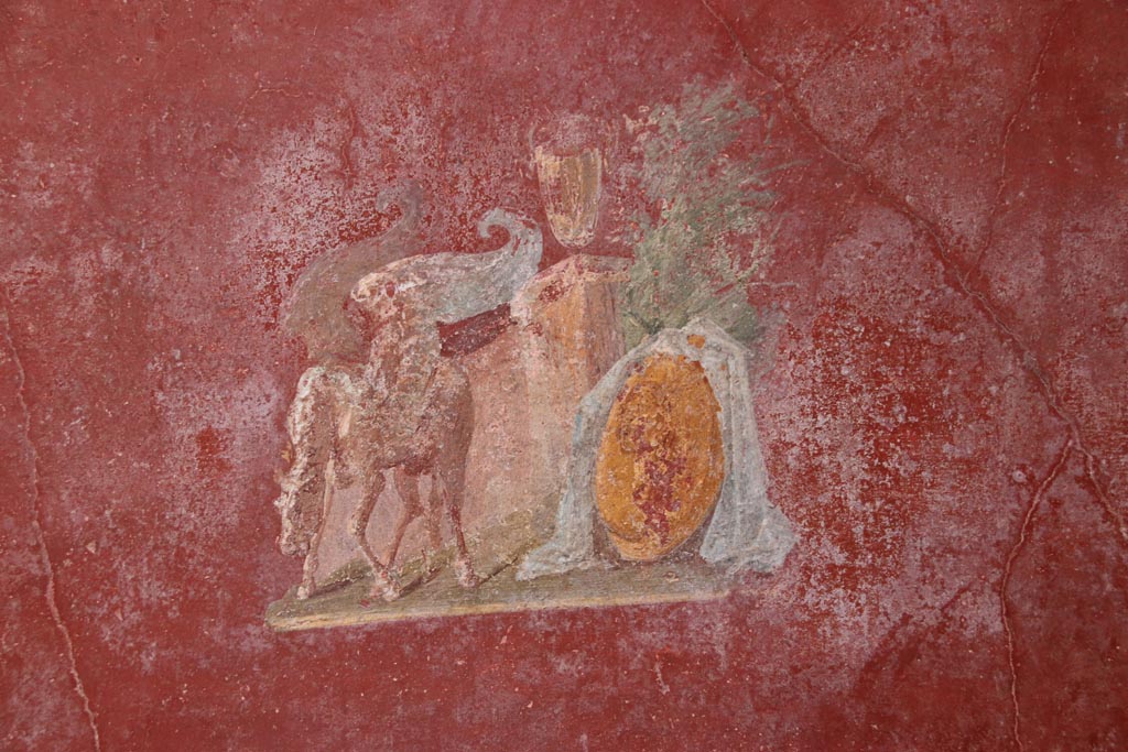 VI.15.1 Pompeii. October 2023. 
North wall of small courtyard/peristyle garden “s”, detail from central panel. Photo courtesy of Klaus Heese. 
