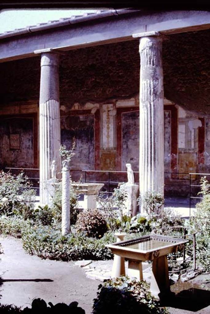 VI.15.1 Pompeii. Old postcard. Looking west from atrium to peristyle garden. Photo courtesy of Rick Bauer.