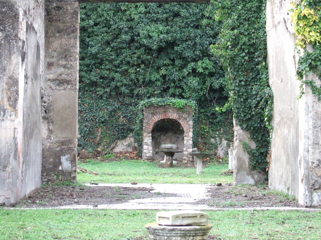 VI.15.5 Pompeii. March 2009. Doorway to room 9, doorway to stairs to upper floor.