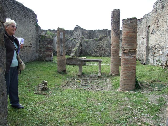 VI.15.6 Pompeii. March 2009. Room 1, east side of table near impluvium.  