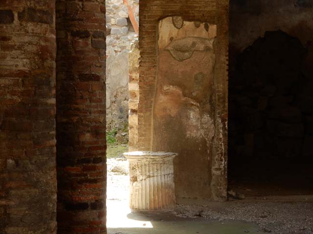 VI.15.9 Pompeii.  March 2009.  Kitchen area,  base of stairs leading to a loft or pergula. Looking south.