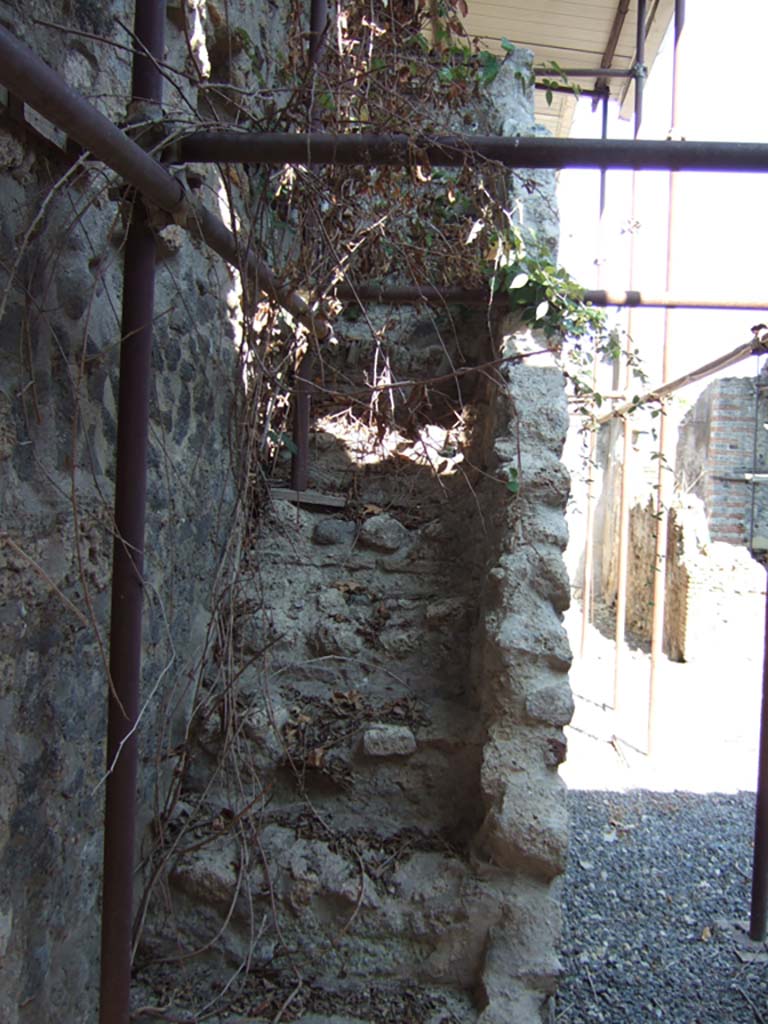 VI.15.26 Pompeii. September 2005. Looking east from entrance towards steps to upper floor, near north wall.