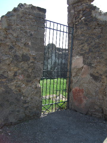VI.16.4 Pompeii. May 2005. Looking west along north wall, towards VI.16.3.  

