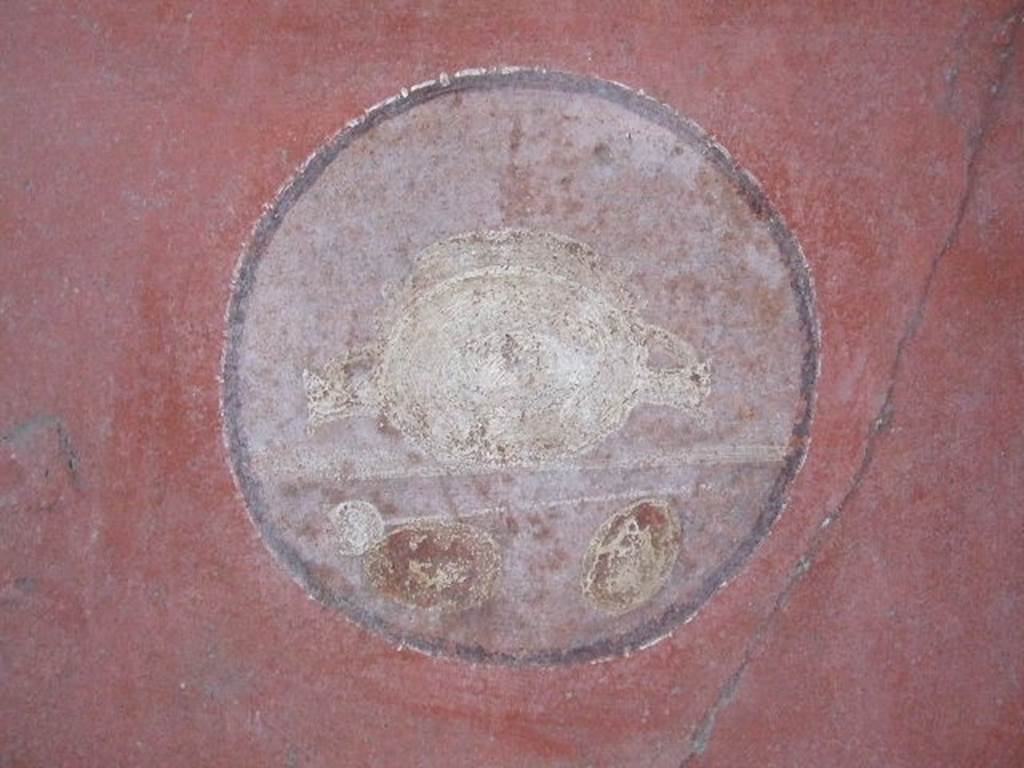 VI.16.15 Pompeii. December 2006. West wall of room F, with detail of painted medallion