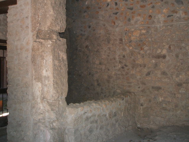 VI.16.17 Pompeii. December 2007. South-west corner of storeroom or kitchen, with doorway to atrium.