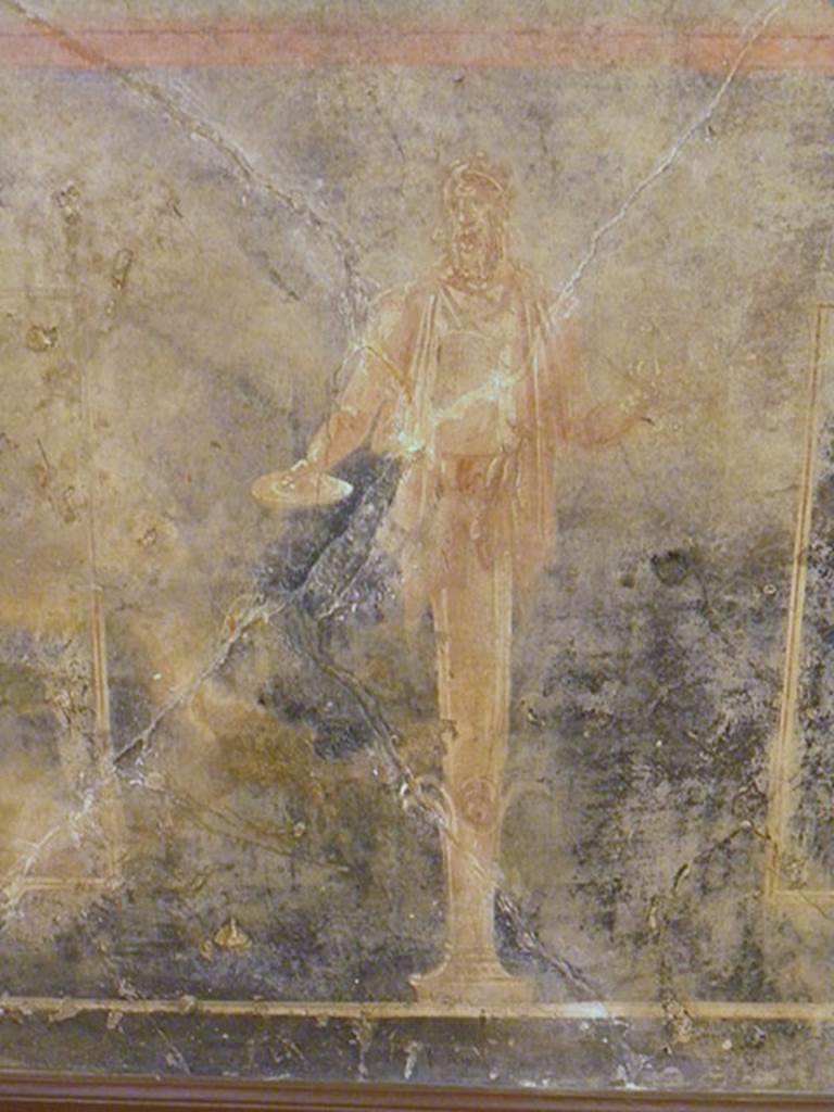 VI.17.25 Pompeii?  Detail of right side herm like satyr holding a patera in the right hand and with a stick on the left shoulder. 
From zoccolo painting found on 3rd November 1764.
