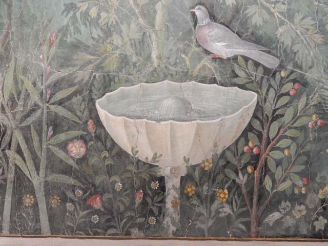 VI.17.42 Pompeii.  Pool in garden below triclinium.  The pool had a fountain jet in the centre and twenty eight jets around the perimeter.