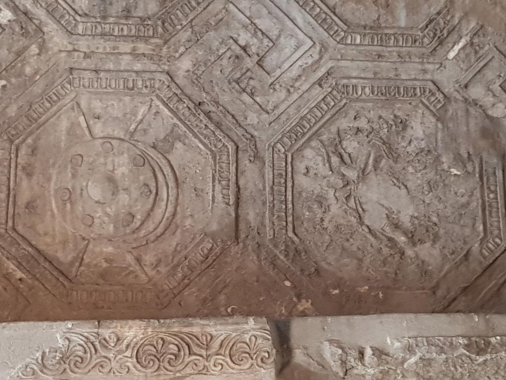 VII.1.8 Pompeii. October 2022. North wall, west end, detail of stucco decoration. Photo courtesy of Klaus Heese.
