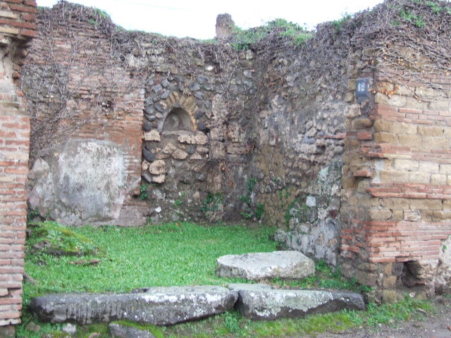 VII.2.12 Pompeii.  Shop.  December 2007.  North wall with staircase.