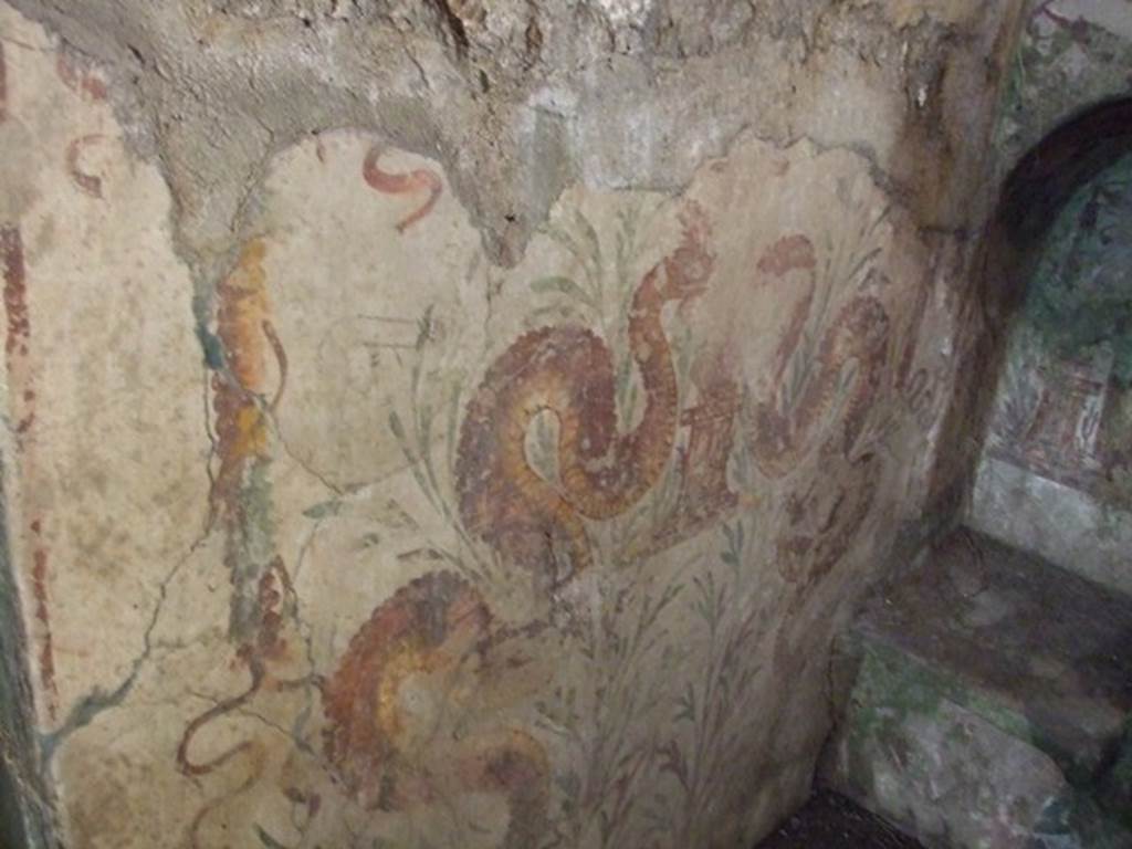 VII.2.20 Pompeii. December 2007. Sacellum.  On the west wall of the room are painted two huge yellow serpents, confronting a small altar. See Boyce above.
