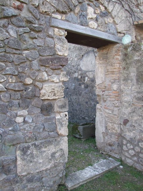 VII.4.31 Pompeii. March 2009. Room 12. Oecus. West wall. Painted figure.