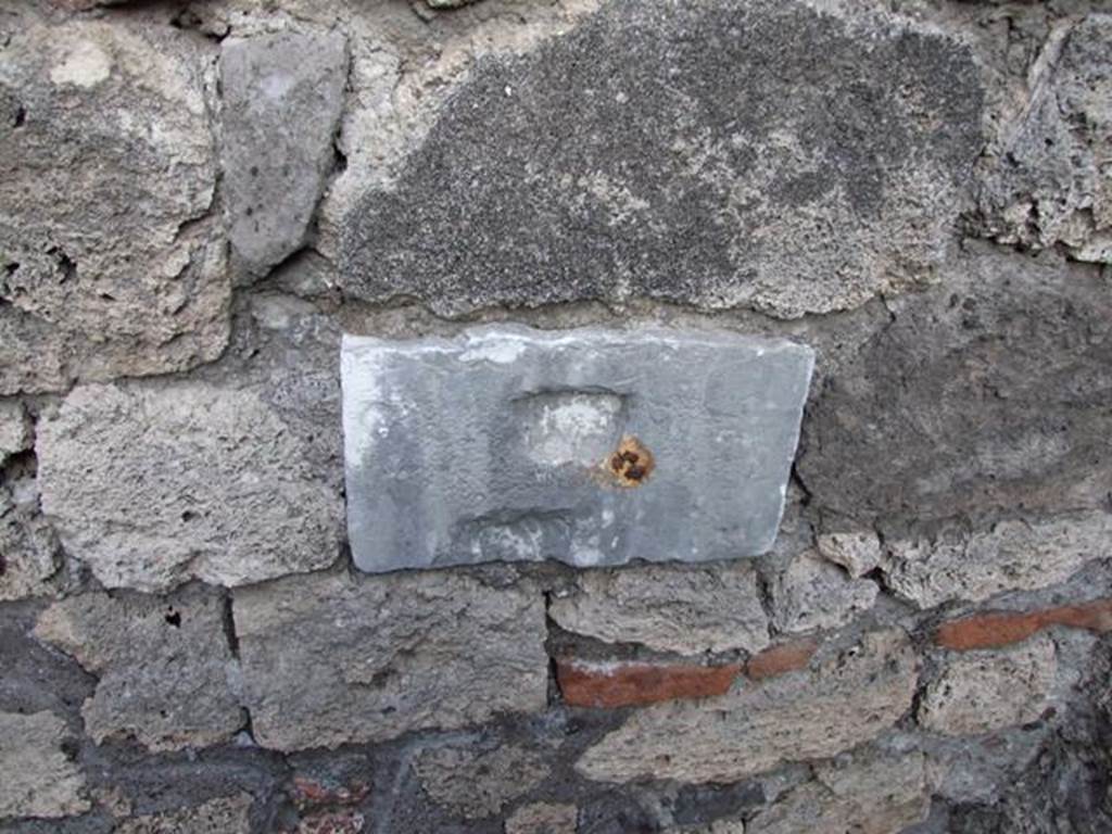 VII.4.48 Pompeii.  December 2007. Room 5.  Stone in wall.