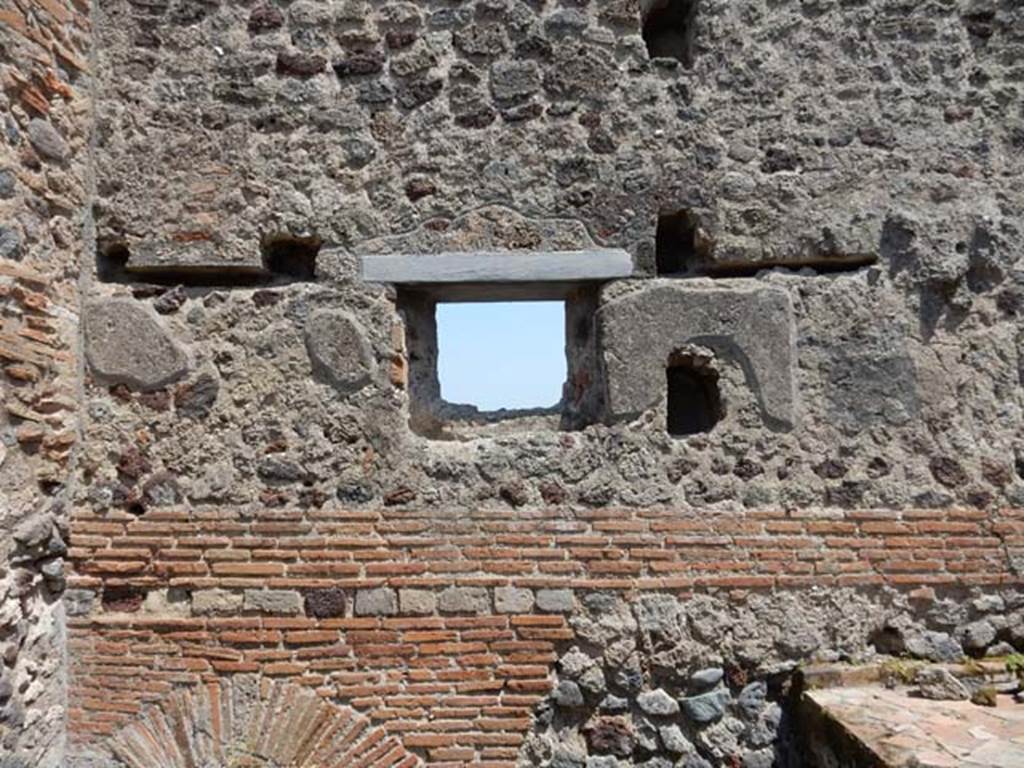 VII.4.48 Pompeii. May 2015. Room 7, window in east wall of kitchen. Photo courtesy of Buzz Ferebee.
