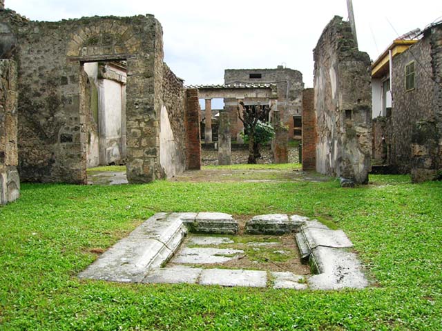 VII.4.59 Pompeii. March 2009. Corridor or andron to peristyle, and ala on west side of atrium.