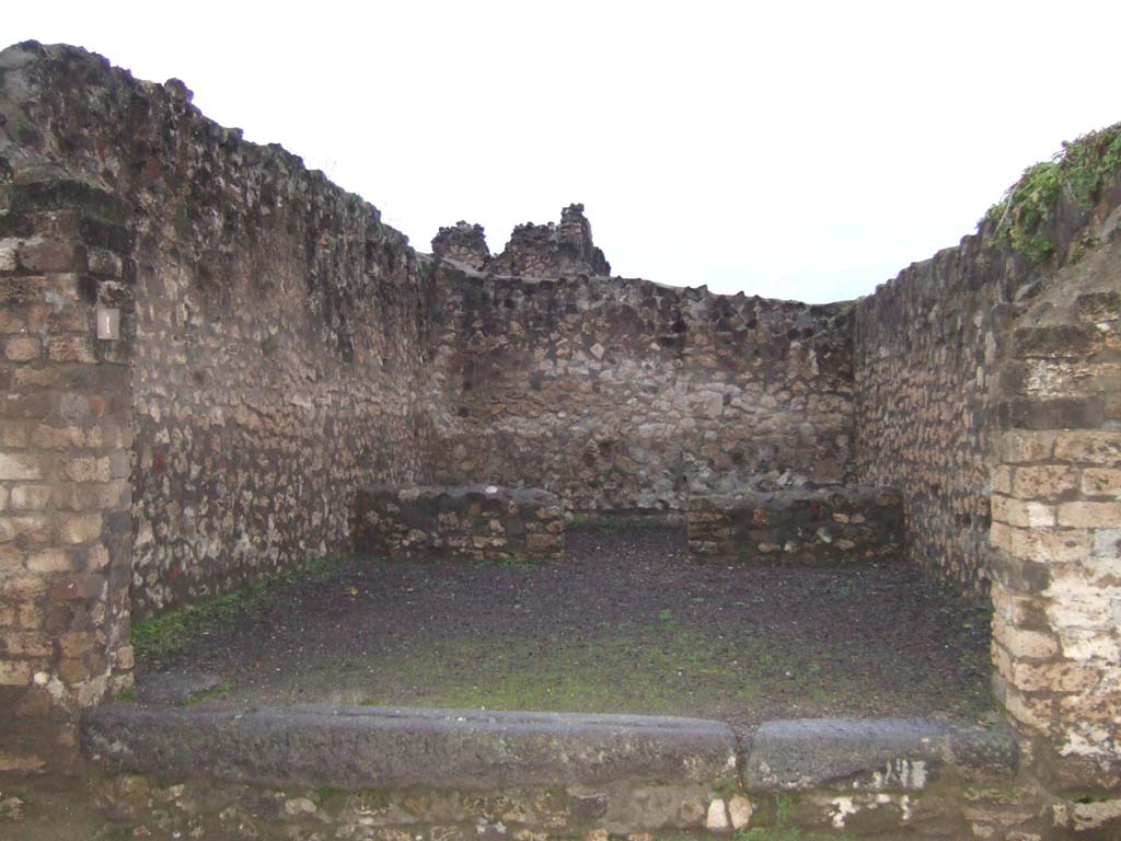 VII.7.1 Pompeii. October 2023. Looking towards west wall of shop. Photo courtesy of Klaus Heese.