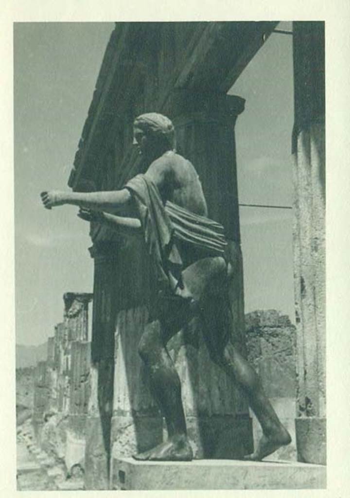 VII.7.32 Pompeii. 1944. Statue of Apollo on east side of Temple of Apollo, in front of the third column. Photo courtesy of Rick Bauer.
