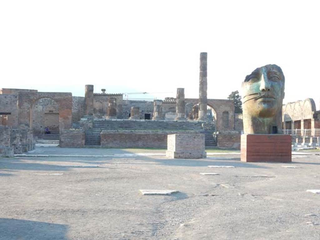 VII.8.1 Pompeii. May 2016. Looking north across the forum towards the temple.
One of 30 monumental sculptures by Igor Mitoraj located around the area of Pompeii, on display until January 2017.
Photo courtesy of Buzz Ferebee.
