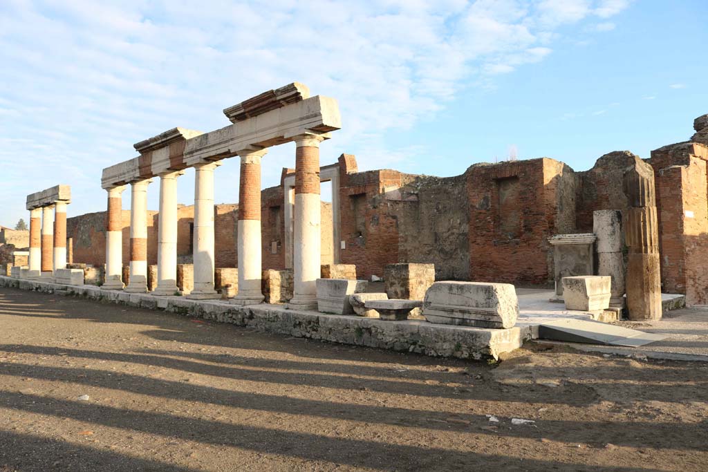 VII.9.1 Pompeii. June 2019. Looking east across Forum towards Eumachia’s Building portico, forming part of the colonnade of the Forum.
Photo courtesy of Buzz Ferebee.
