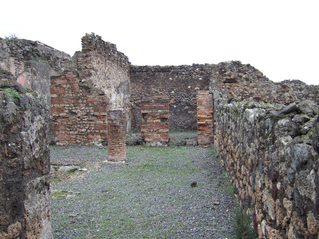 VII.9.38 Pompeii. December 2005. Looking towards doorway to triclinium, in north-west corner of atrium. According to Helbig, a painting of Danae was found in the triclinium.
See Helbig, W., 1868. Wandgemälde der vom Vesuv verschütteten Städte Campaniens. Leipzig: Breitkopf und Härtel. (120)