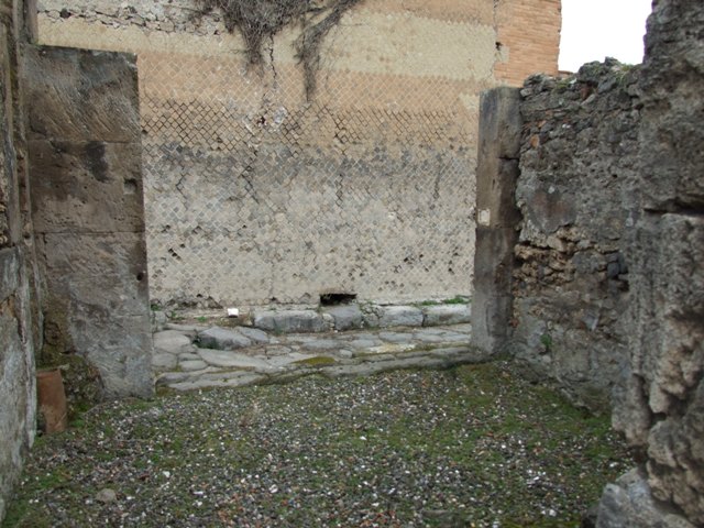 VII.9.48 Pompeii. March 2009. Looking north to the north-west corner of the shop, from atrium of VII.9.47