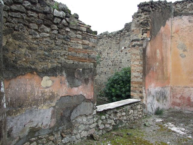 VII.14.5 Pompeii. March 2009. Room 11. Peristyle garden area. East end. Looking north. One of three pillars that supported the Portico.