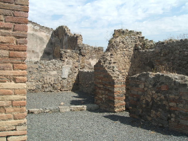 VII.14.6 Pompeii. December 2007. West wall with remains near north-west corner.