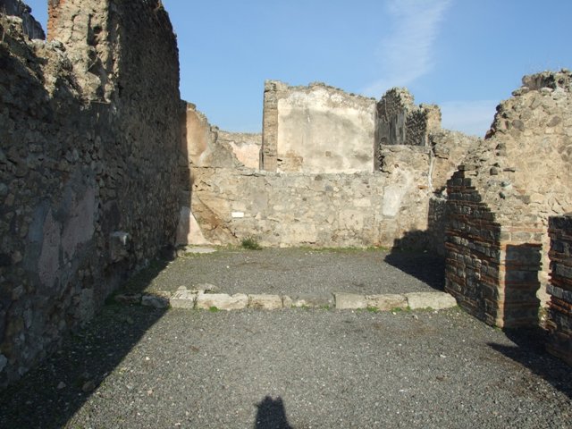 VII.14.6 Pompeii. December 2007. West wall of shop and rear room.