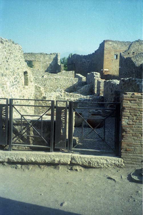 VIII.1 Pompeii, on left. March 2009.Looking west on Via Marina. VII.16.7 on right.