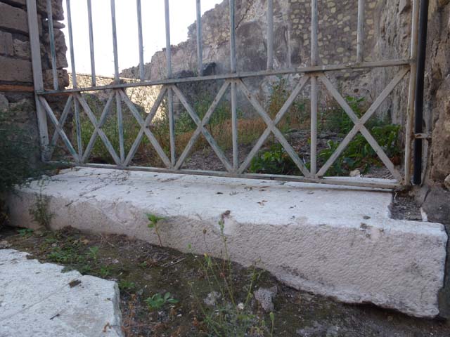 VII.6 Pompeii. September 2005. Vicolo del Farmacista, looking south.    VII.16 on right.  According to Garcia y Garcia, in 1943 the internal unexcavated area between VII.16. A and B (20 and 21) along the Vicolo del Farmacista was hit by a bomb. It fell on the soil not yet excavated and demolished the perimeter wall for a length of 4m x 3m and a part of the escarpment in two areas for 8 metres..
See Garcia y Garcia, L., 2006. Danni di guerra a Pompei. Rome: L’Erma di Bretschneider. (p.137)
