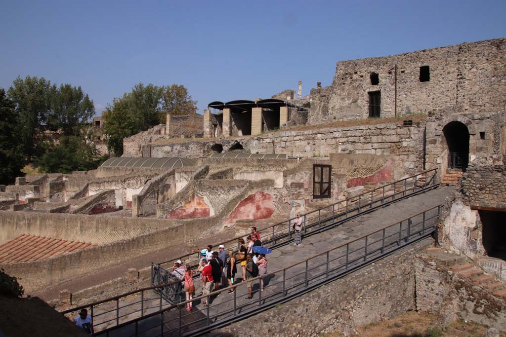 VII.16.a Pompeii. September 2019.  Looking north-east across Baths, lower left, along roadway leading to Porta Marina, on right.
Photo courtesy of Klaus Heese.
