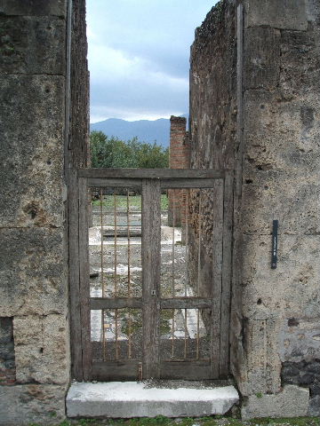 VIII.2.1 Pompeii. December 2005. Doorway to triclinium in north-east corner, on east side of atrium.