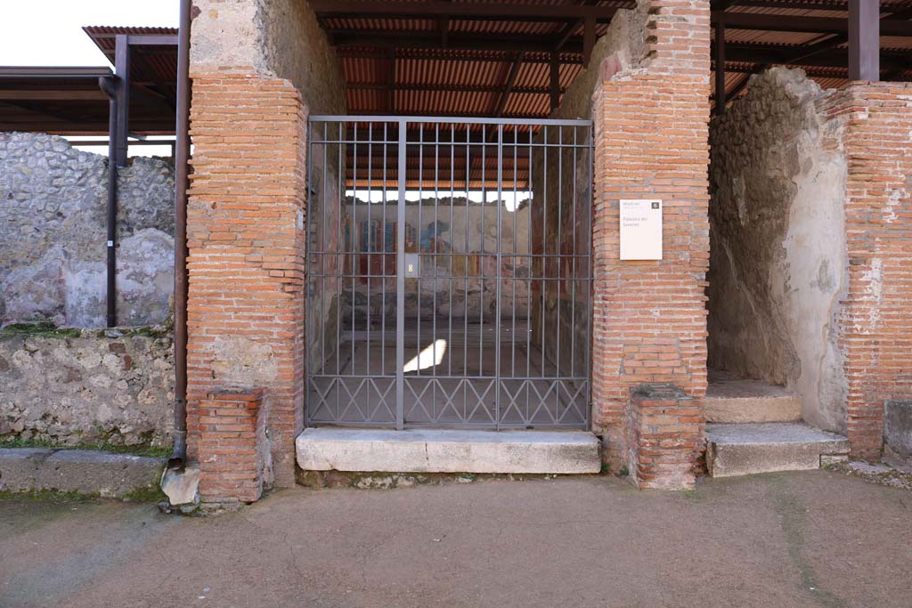 VIII.2.23 Pompeii, on left, with VIII.2.22, on right. December 2018. 
Looking towards entrance doorways on south side of Via della Regina. Photo courtesy of Aude Durand.



