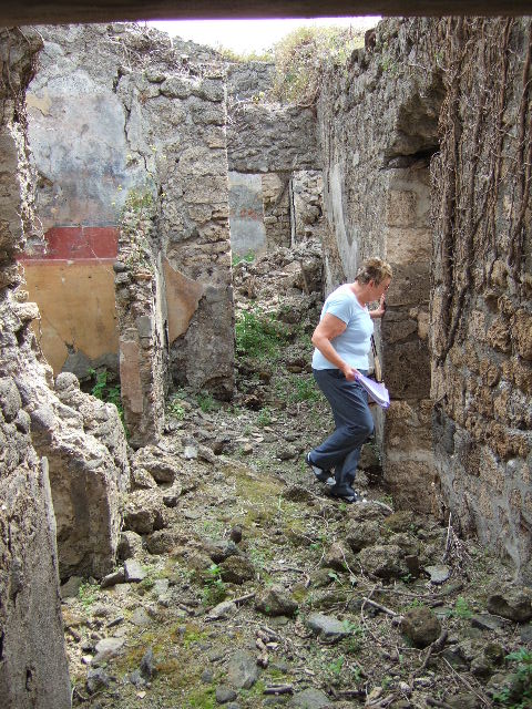 VIII.2.34 Pompeii. May 2006. Looking east across rooms on lower rear level from VIII.2.30
