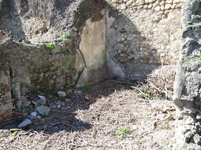 VIII.3.4 Pompeii. March 2009. Room 18, west wall, with remains of previous buildings, probably pulled down after the earthquake.