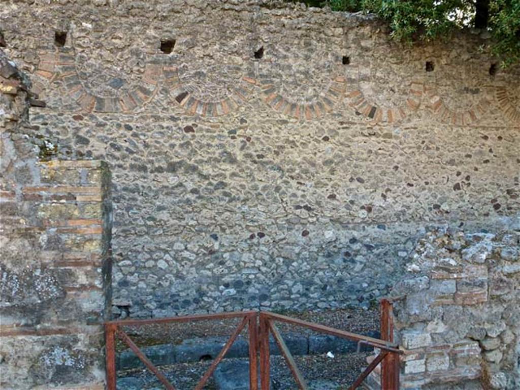 VIII.3.14 Pompeii. September 2011. Looking west to exterior wall in Vicolo dei 12 Dei, taken from VIII.2.10. 
