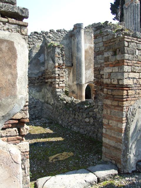 VIII.4.4 Pompeii. March 2009. Doorway to room 6, triclinium with window onto east portico. According to Helbig, this room contained the following wall paintings: Ariadne forsaken by Theseus (1229) and Phrixus and Helle (1254)
See Helbig, W., 1868. Wandgemälde der vom Vesuv verschütteten Städte Campaniens. Leipzig: Breitkopf und Härtel.
