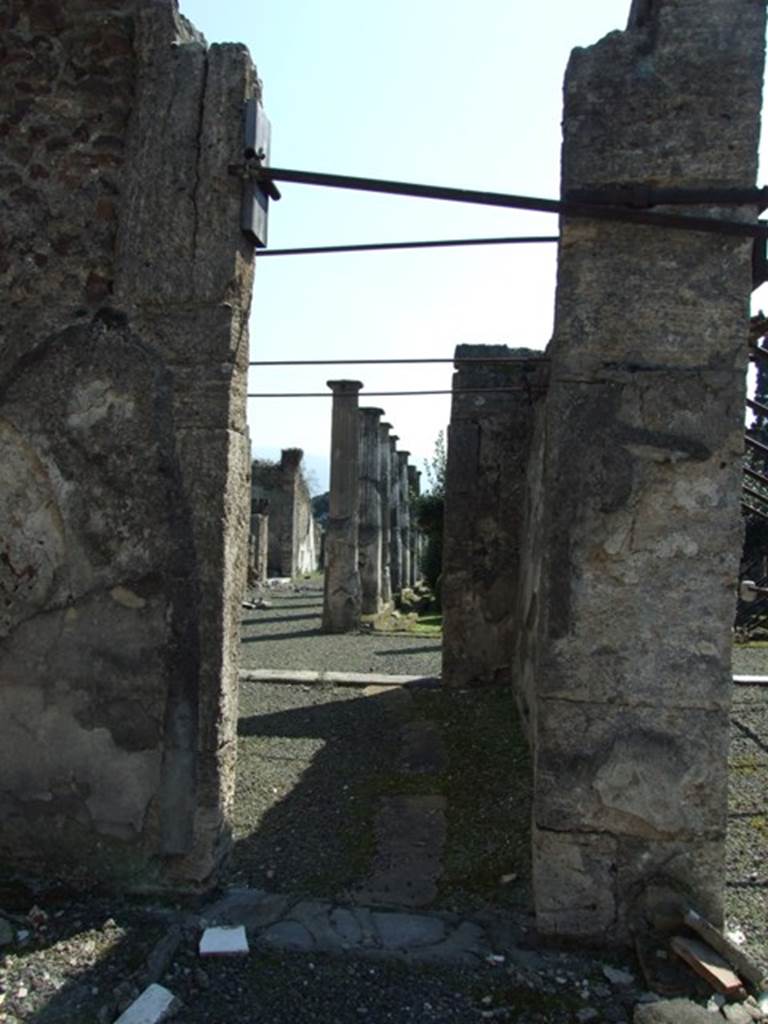 VIII.4.15 Pompeii. March 2009. Room 5, small doorway in rear wall, from south-east corner of atrium.