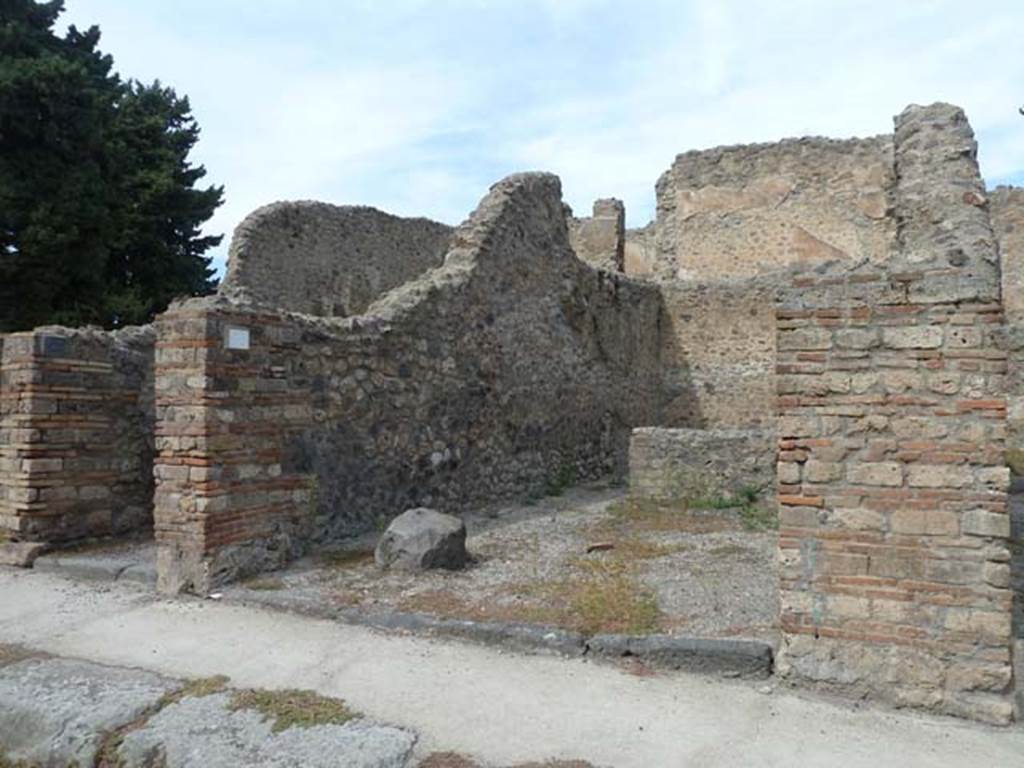 VIII.4.36 Pompeii, September 2015. Looking north to entrance doorway on north side of Via del Tempio dIside.