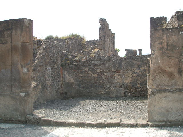 VIII.5.3 Pompeii. December 2007. South wall with blocked doorway to atrium of VIII.5.2.