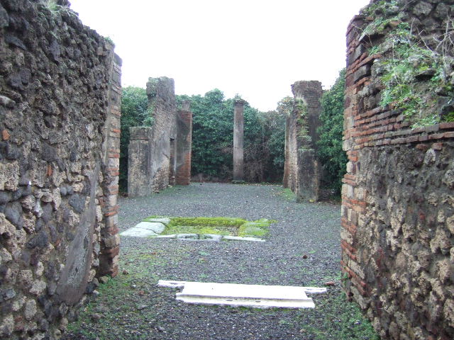 VIII.5.9 Pompeii. March 2009. Room 2, north wall with doorway into shop at VIII.5.8