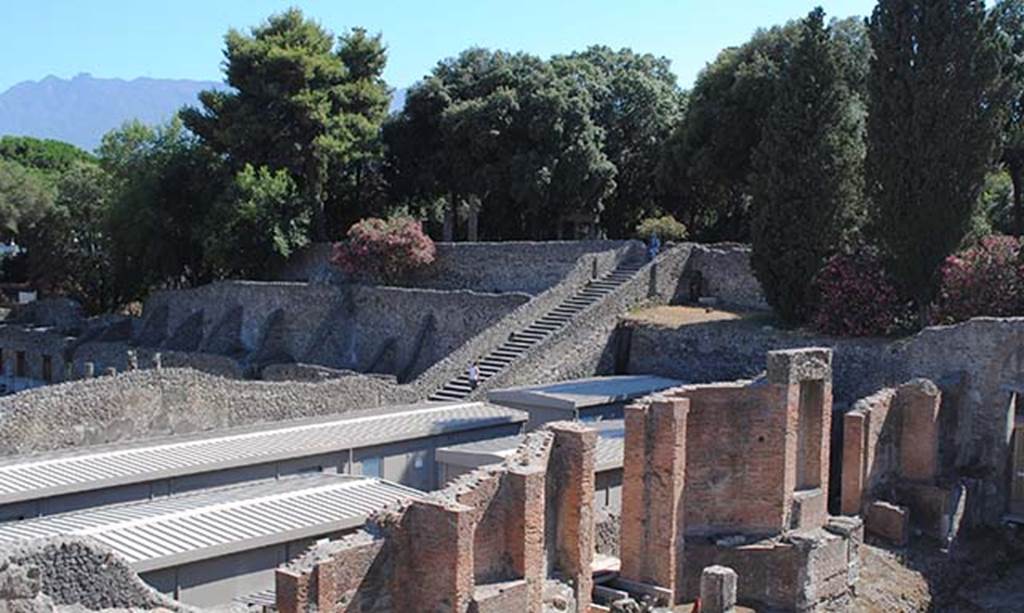 VIII.7.20 Pompeii. July 2012. Looking south-west across stage area of Large Theatre, towards steps leading to Triangular Forum. Photo courtesy of John Vanko. His father took the identical photo in February 1952, see below.
