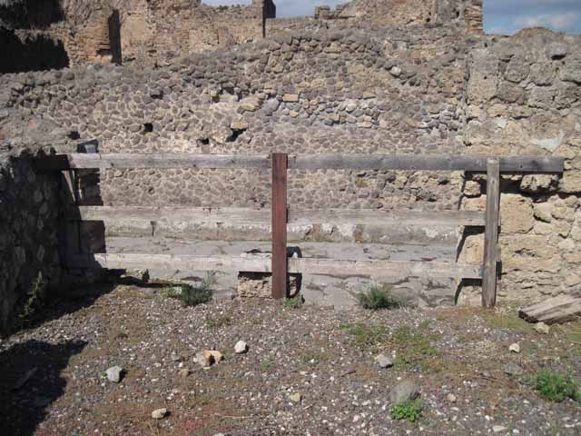 VIII.7.26 Pompeii. September 2010. Remains of west wall, looking west into third room, followed by room with entrance doorway. Photo courtesy of Drew Baker.
