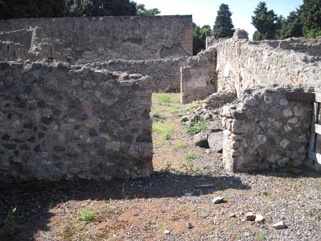 VIII.7.26 Pompeii. September 2010. Looking west into main entrance room from third room. Photo courtesy of Drew Baker.
