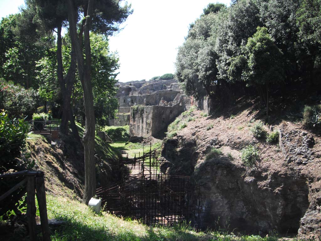 VIII.7.30 Pompeii and walls near Triangular Forum from outside city. June 2012.  
Looking west from rear of Triangular Forum, towards rear of houses in VIII.2. Photo courtesy of Ivo van der Graaff.
