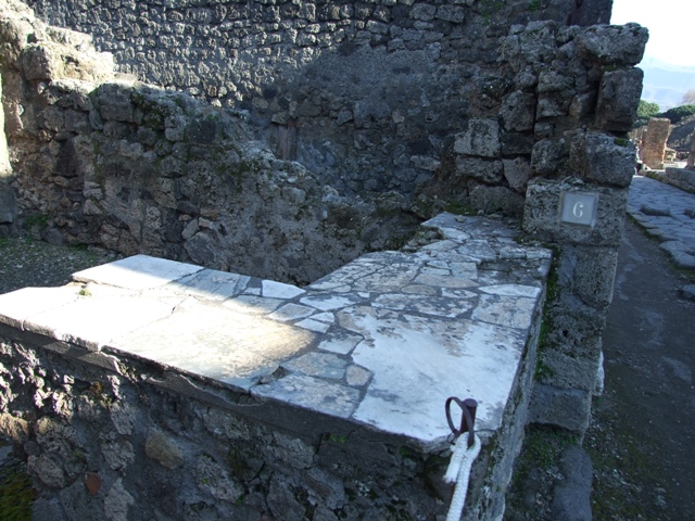 IX.1.6 Pompeii. March 2009. North-west corner of bar room.  Drainpipe from upper level.
