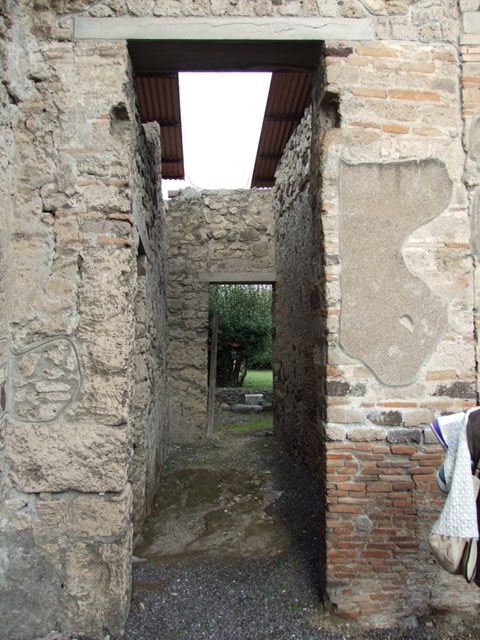 IX.1.20 Pompeii. December 2007. Room 16, view from upper floor.
Looking north across IX.1 towards Vesuvius