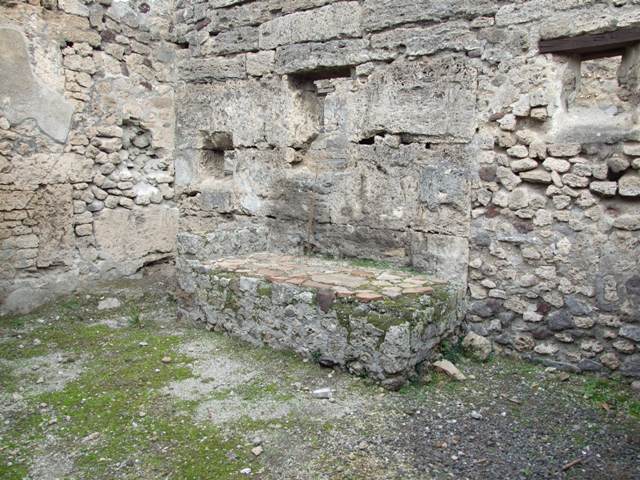 IX.1.22 Pompeii. December 2007. Room 14, remains of painted decoration on west side of first peristyle.   