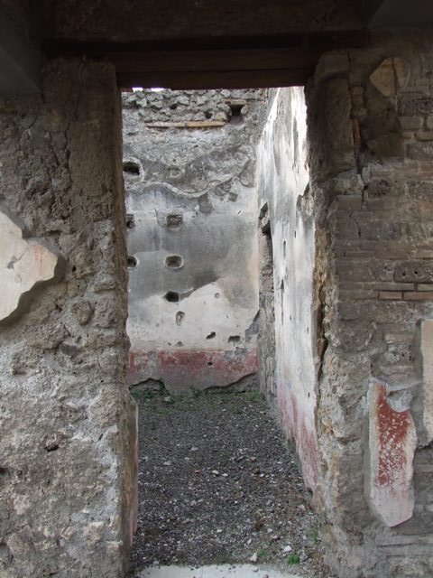 IX.1.22 Pompeii. December 2007. Room 19, west wall with remains of wall painting.